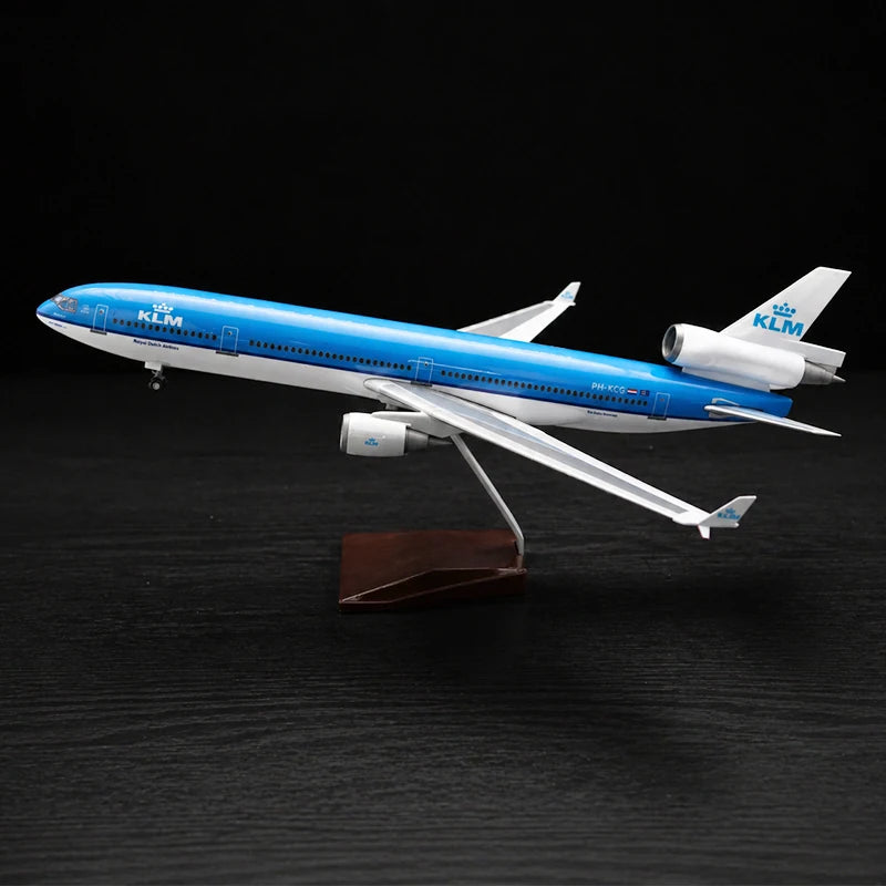 KLM Royal Dutch Airlines McDonnell Douglas MD-11 scale model 1:130 featuring illuminated LED cabin lights and a premium solid wood base