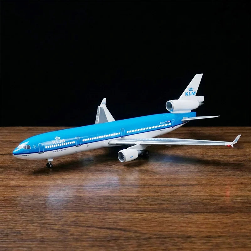 KLM Royal Dutch Airlines McDonnell Douglas MD-11 scale model 1:130 featuring illuminated LED cabin lights and a premium solid wood base