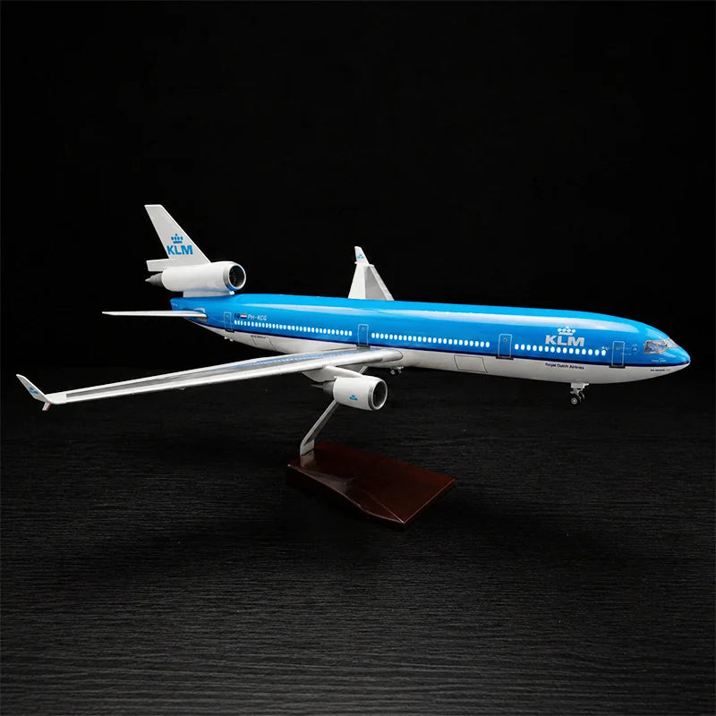 KLM Royal Dutch Airlines McDonnell Douglas MD-11 scale model 1:130 featuring illuminated LED cabin lights and a premium solid wood base