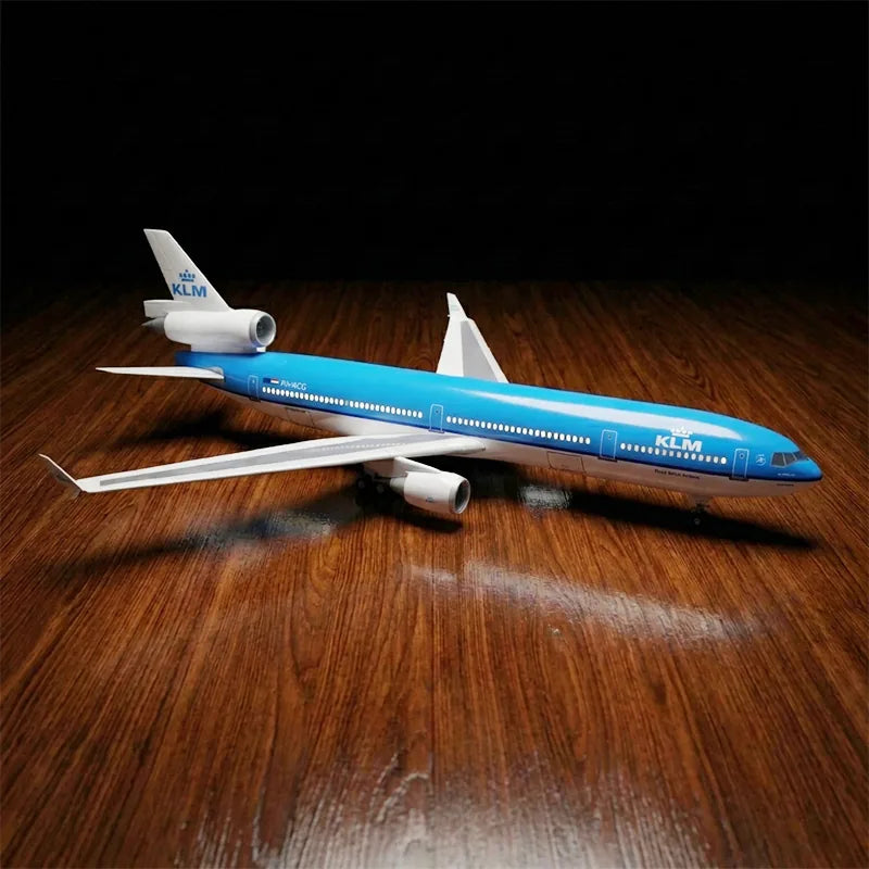 KLM Royal Dutch Airlines McDonnell Douglas MD-11 scale model 1:130 featuring illuminated LED cabin lights and a premium solid wood base