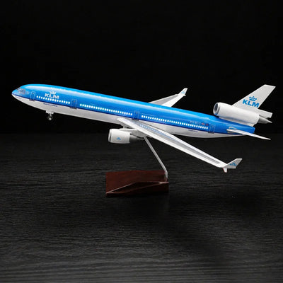 KLM Royal Dutch Airlines McDonnell Douglas MD-11 scale model 1:130 featuring illuminated LED cabin lights and a premium solid wood base