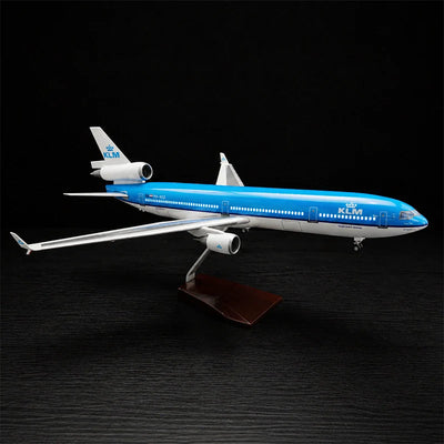 KLM Royal Dutch Airlines McDonnell Douglas MD-11 scale model 1:130 featuring illuminated LED cabin lights and a premium solid wood base
